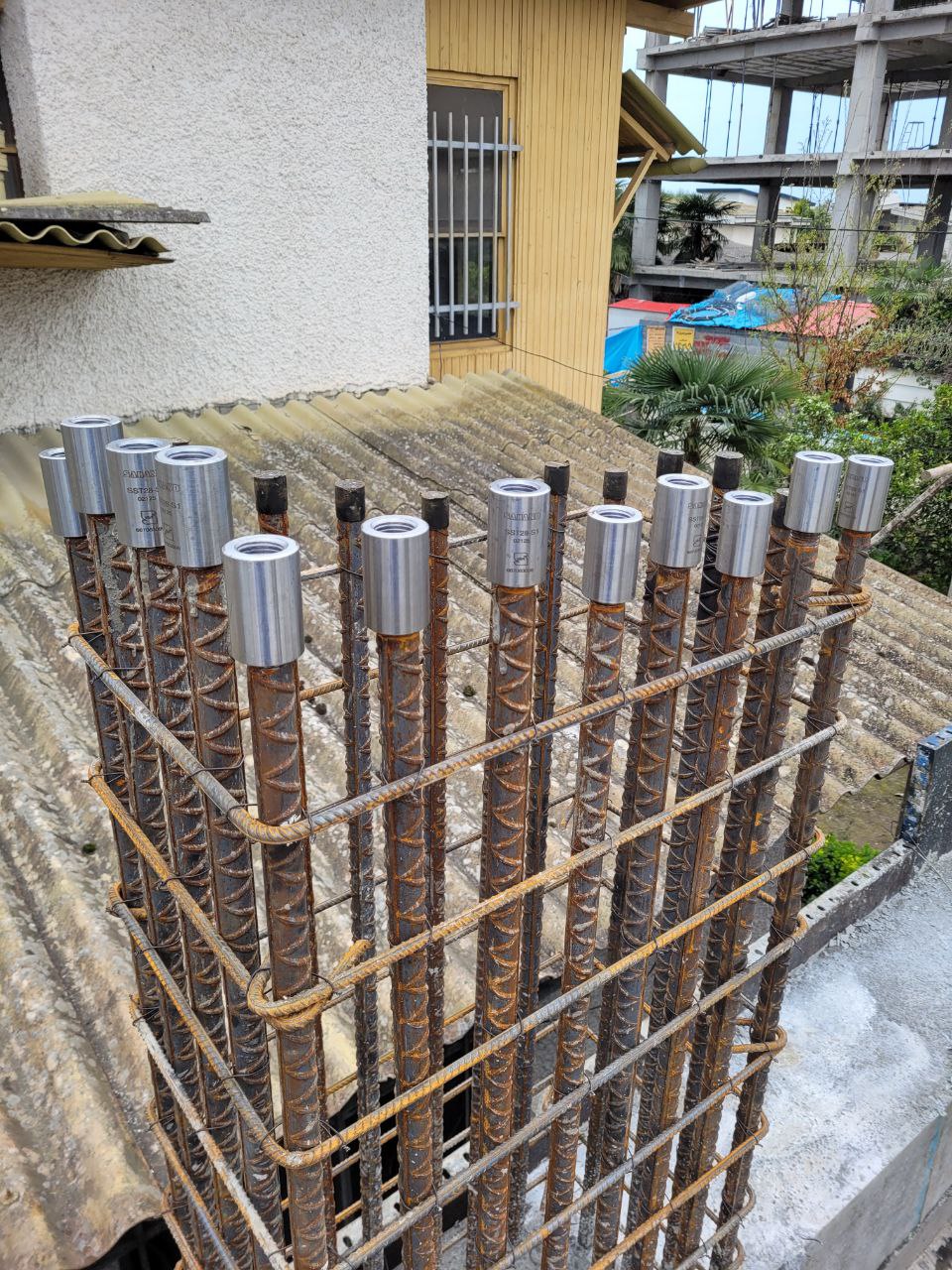 Column rebar coupling during structural works of Redline residential construction
