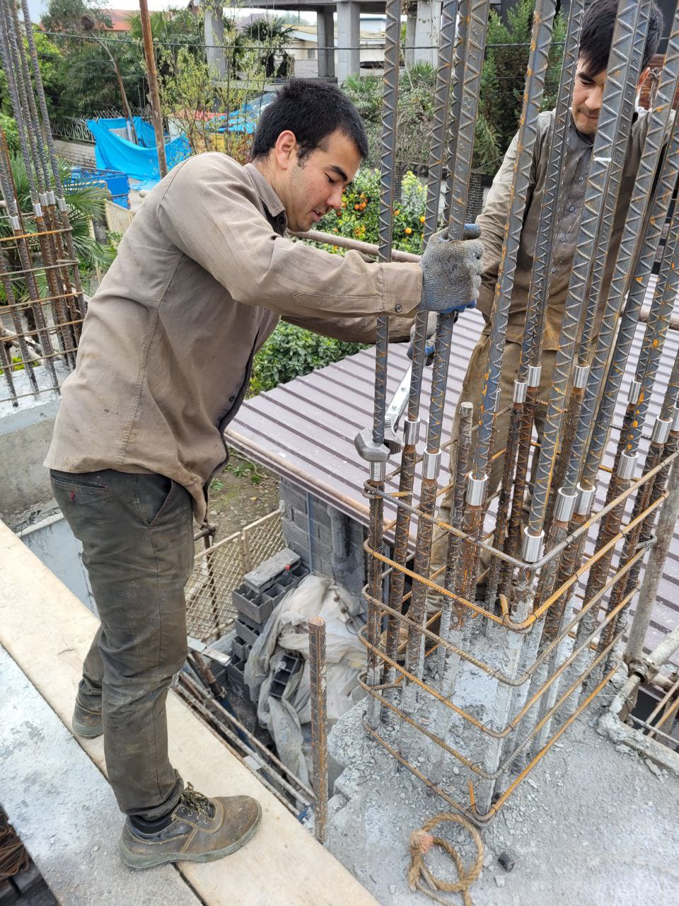 Column rebar coupling during structural works of Redline residential construction