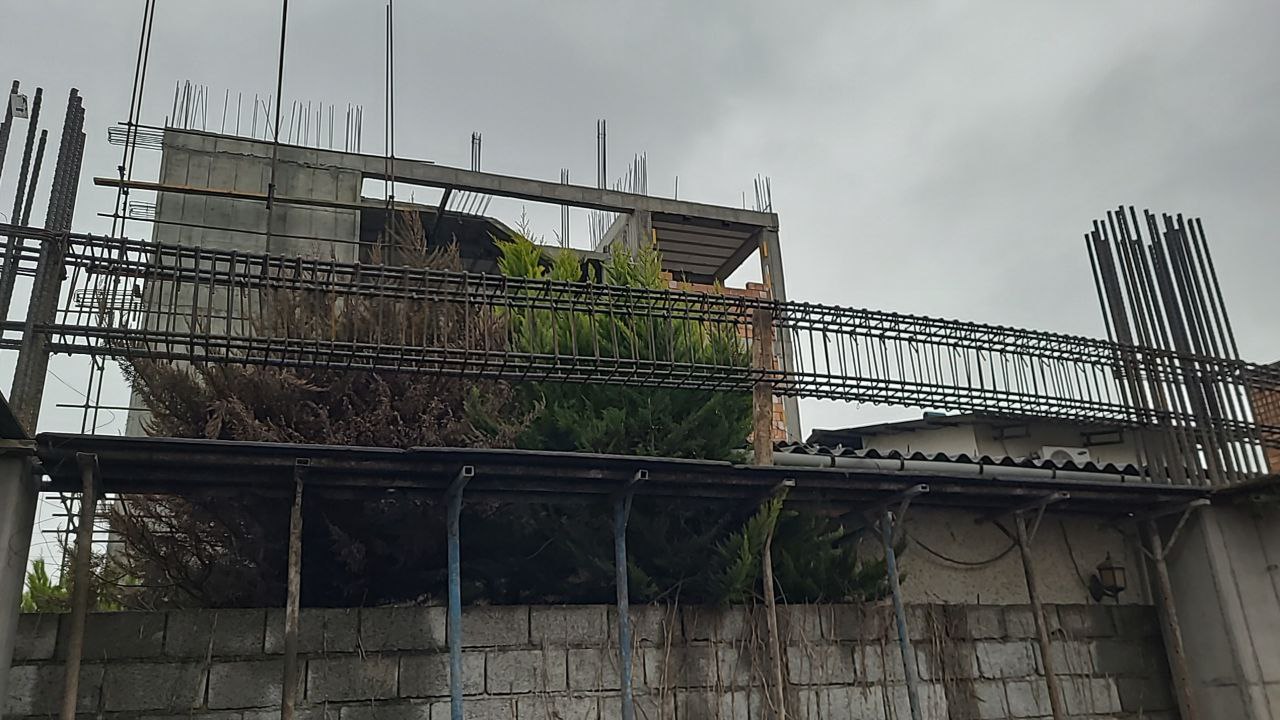 Beam formwork preparation during structural works of Redline residential building
