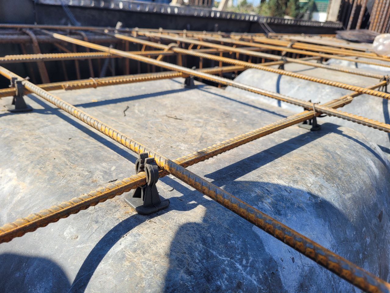 Rebar spacers placement for waffle slab reinforcement – Redline residential construction