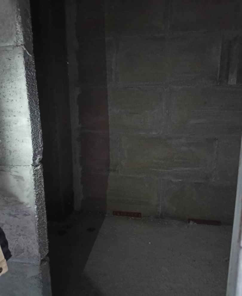 Masonry partition wall under construction at interior section of the building