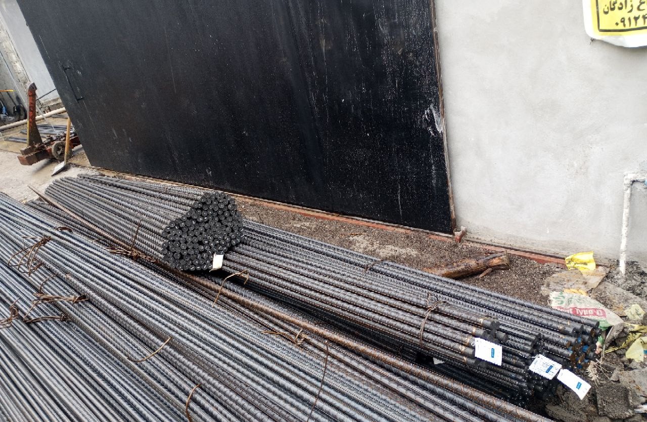 Threaded steel rebars prepared for column reinforcement coupling at Redline construction site