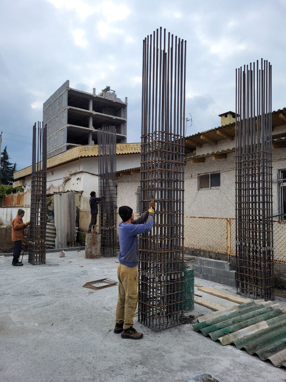 Column reinforcement installation during structural phase of Redline residential project